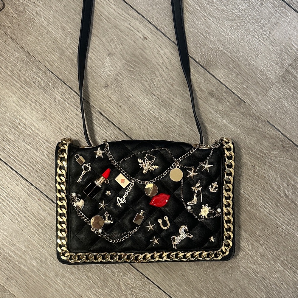 Aldo Black Crossbody Bag with Gold and Red Accents
